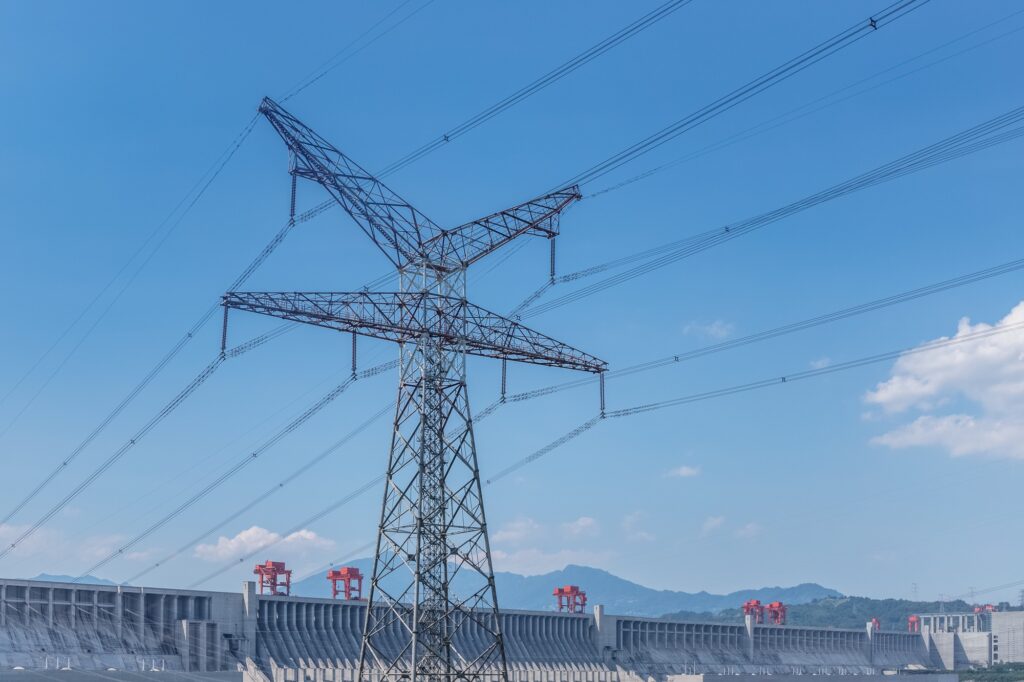 power transmission tower and hydroelectric dam